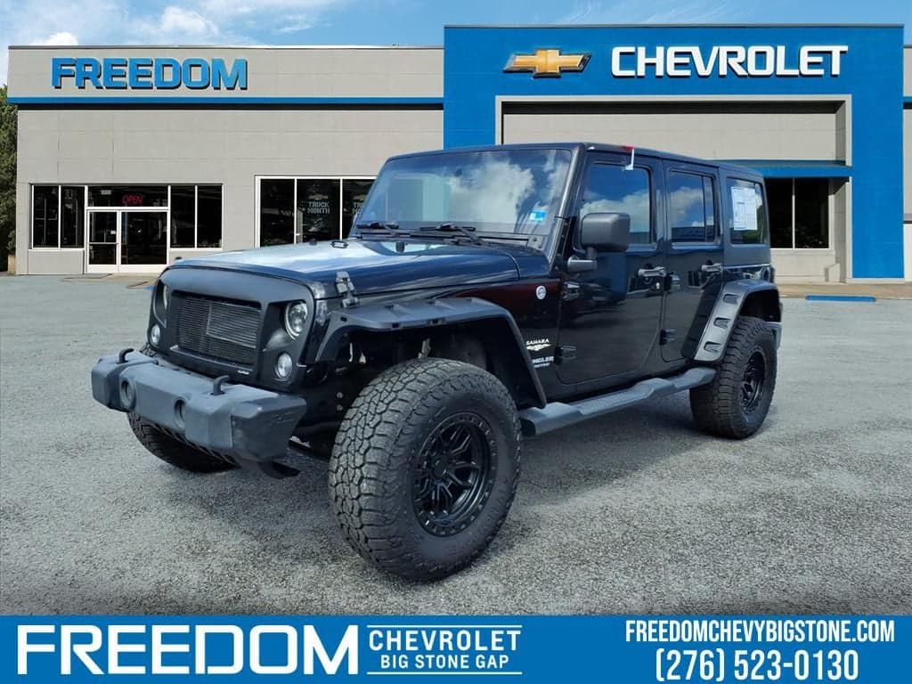 2014 Jeep Wrangler Sahara — photo 1 of 35