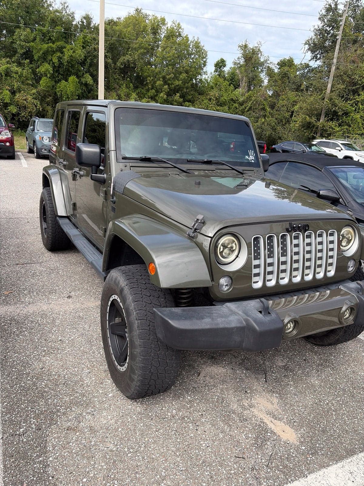 2016 Jeep Wrangler Unlimited Sahara — photo 1 of 5