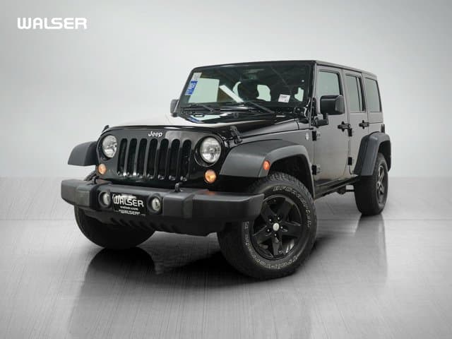 2015 Jeep Wrangler Sport — photo 1 of 27