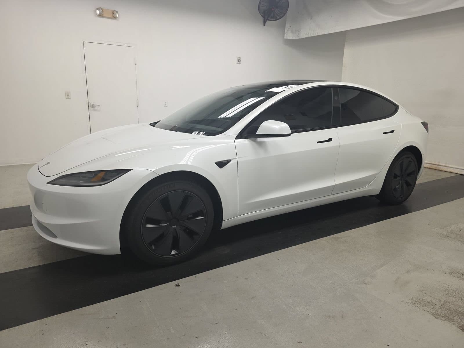2025 Tesla Model 3 Long Range — photo 1 of 12
