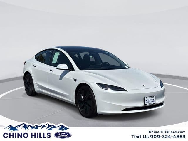2024 Tesla Model 3 Long Range — photo 1 of 38