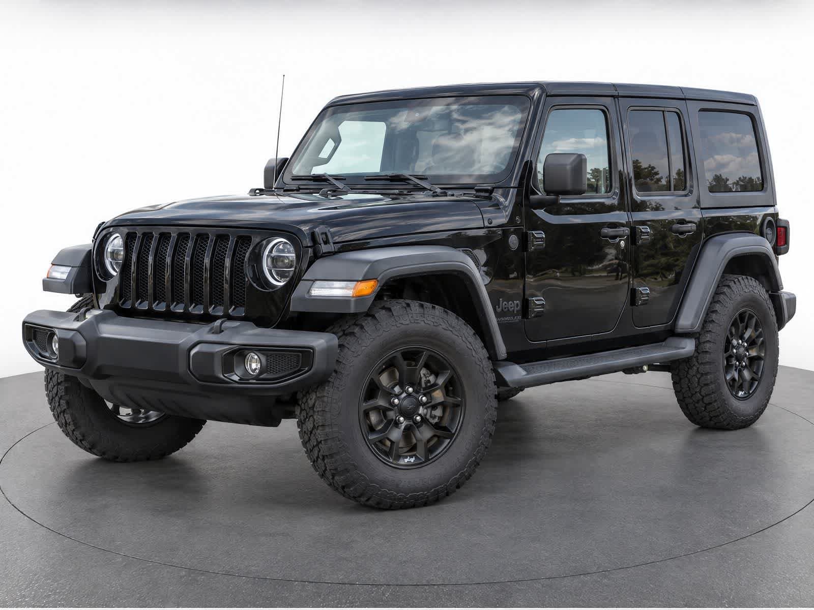 2021 Jeep Wrangler Unlimited Sport — photo 1 of 14
