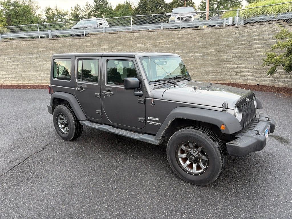 2016 Jeep Wrangler Unlimited Sport — photo 1 of 9