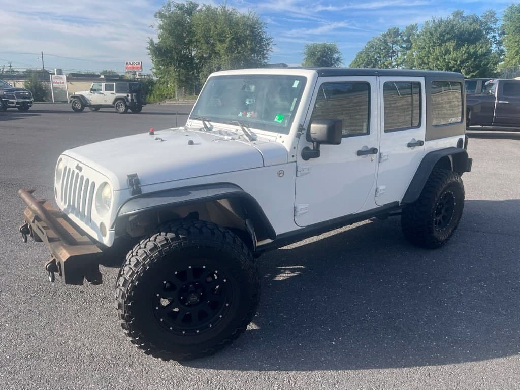 2013 Jeep Wrangler Unlimited Sport — photo 1 of 6
