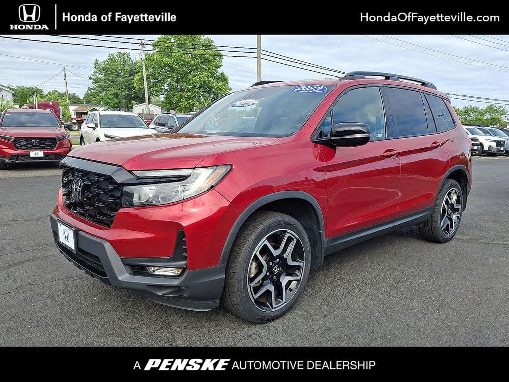 2023 Honda Passport Elite — photo 1 of 34