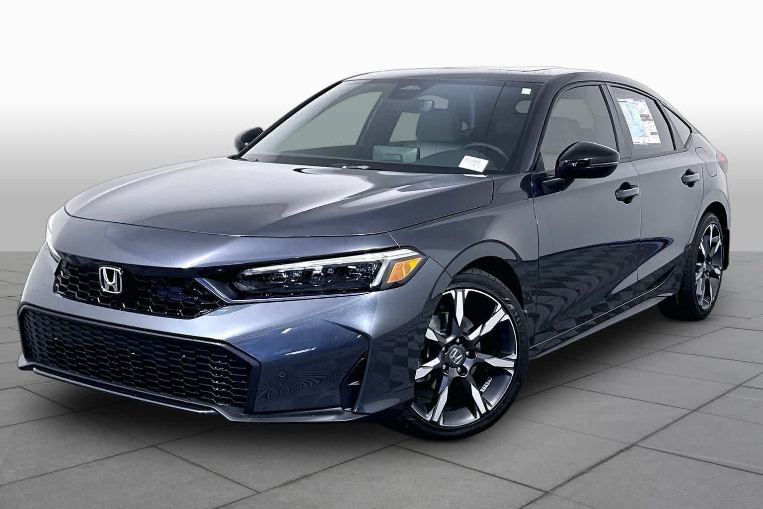 2027 Honda Civic Hatchback Hybrid Sport Touring — photo 1 of 19