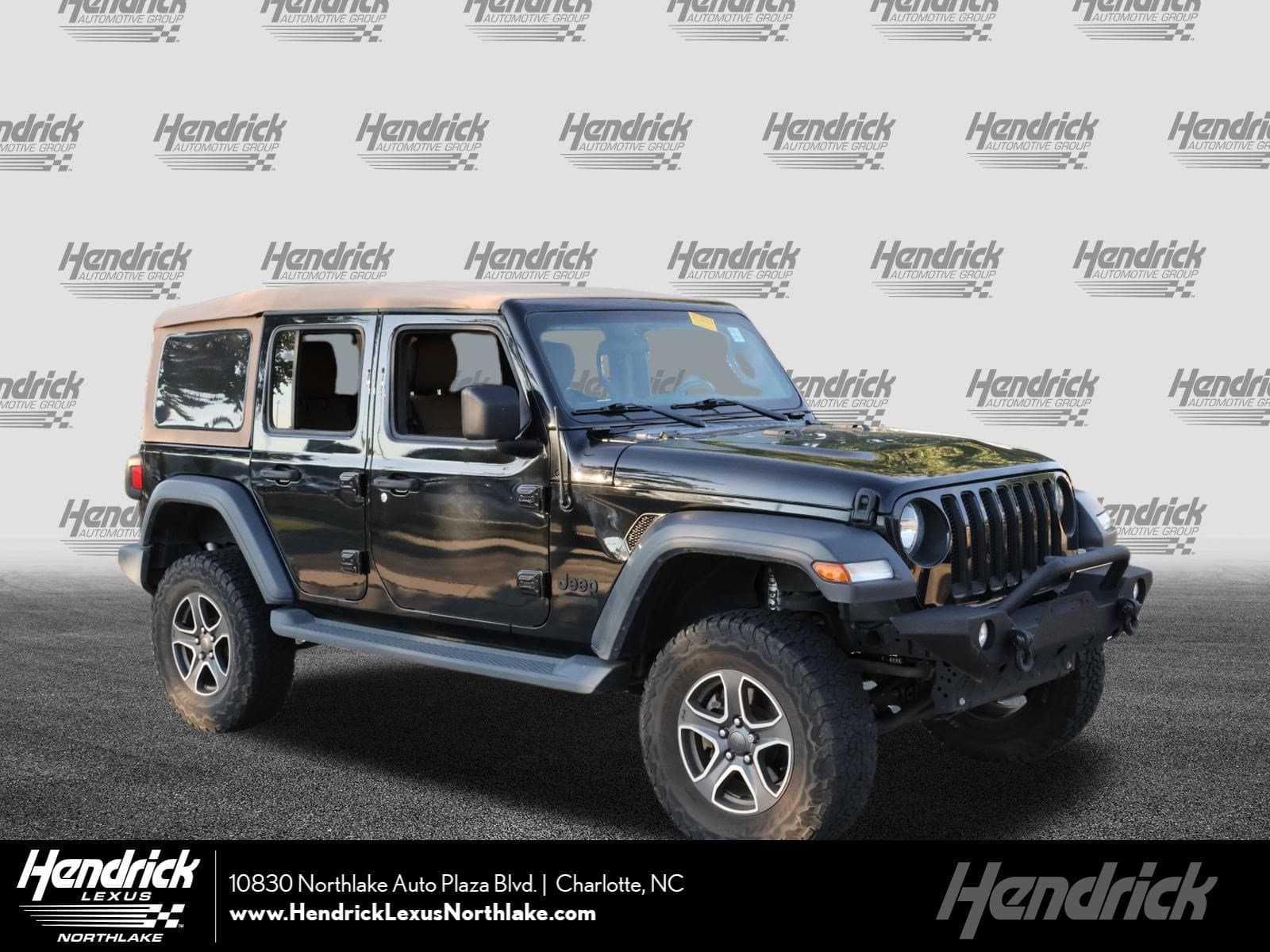 2020 Jeep Wrangler Unlimited Black and Tan — photo 1 of 33