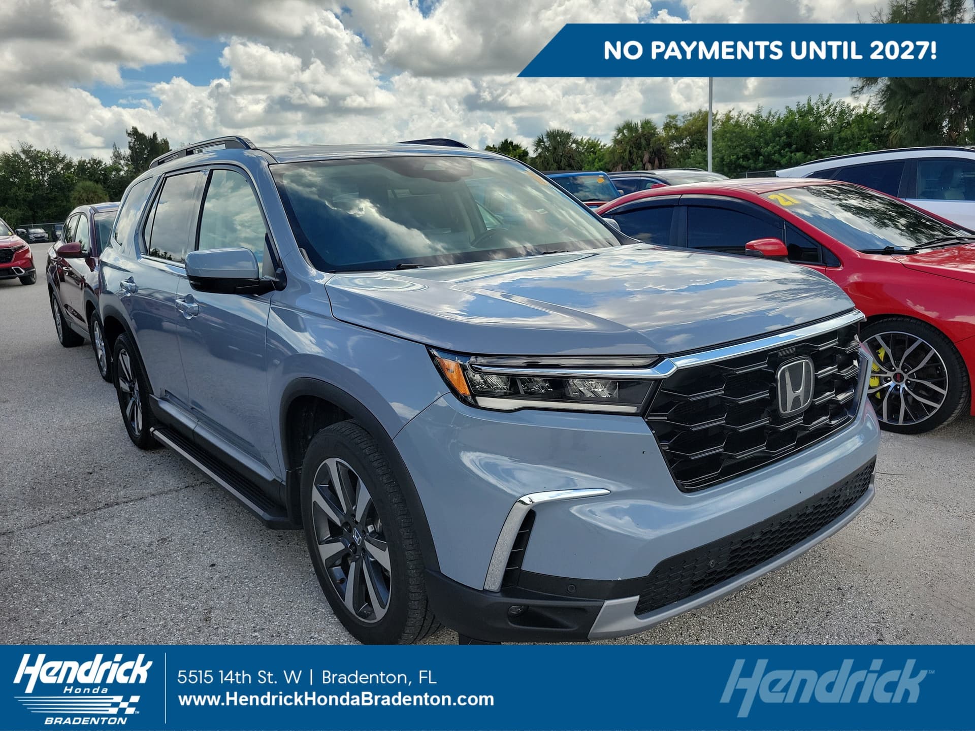 2025 Honda Pilot Touring — photo 1 of 11