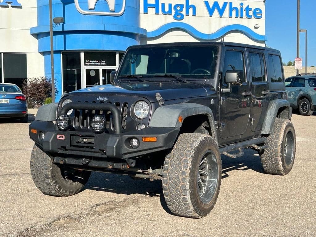 2016 Jeep Wrangler Unlimited Sport — photo 1 of 9