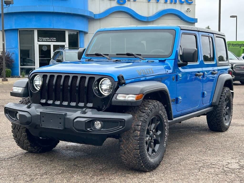 2023 Jeep Wrangler Sport — photo 1 of 9