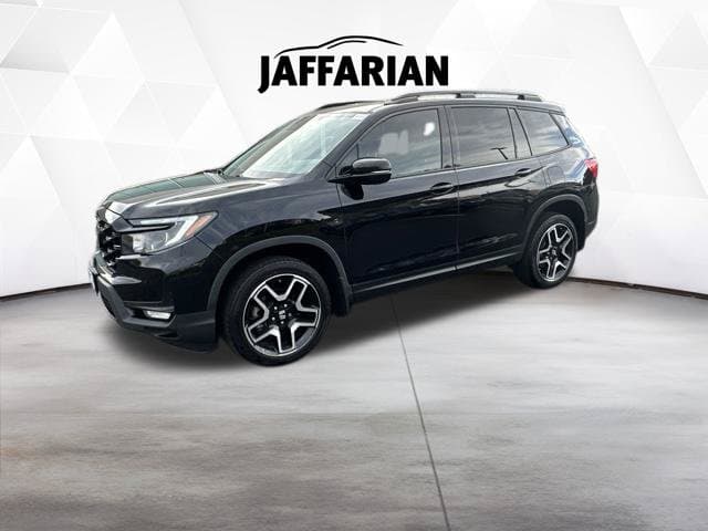 2023 Honda Passport Elite — photo 1 of 17
