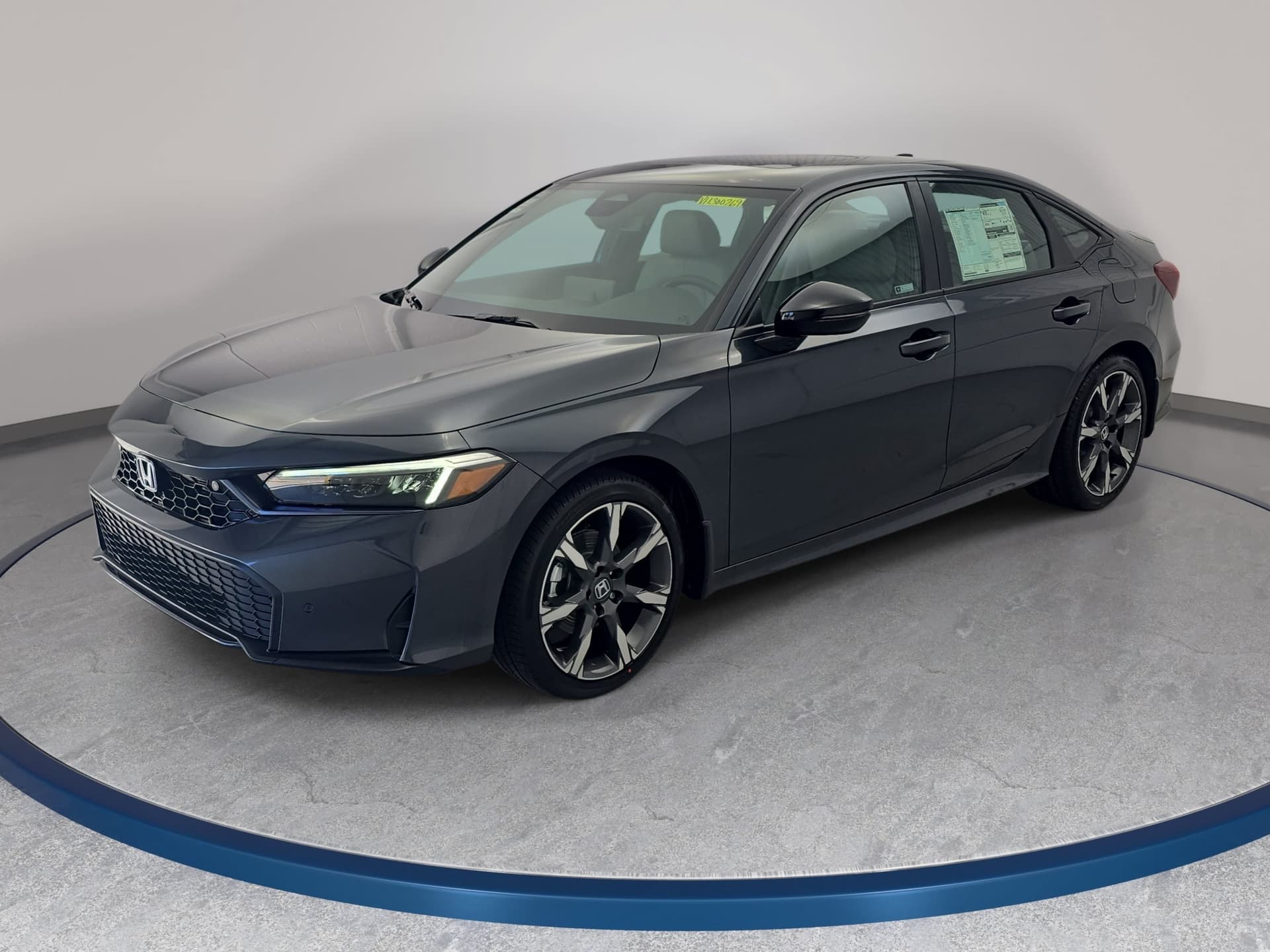 2027 Honda Civic Sedan Hybrid Sport Touring — photo 1 of 35