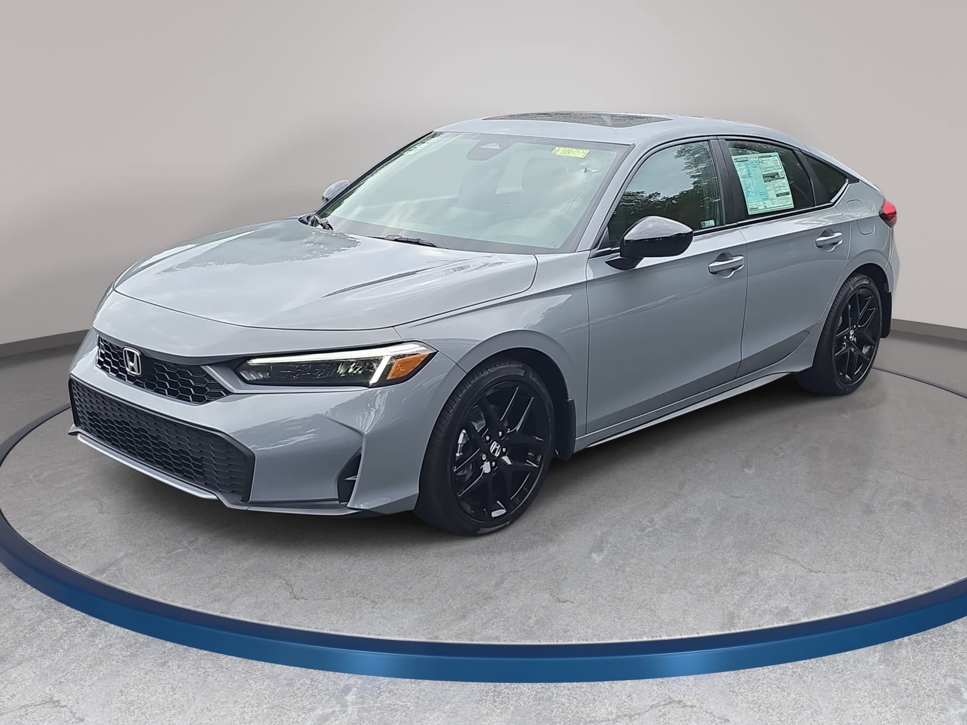 2027 Honda Civic Hatchback Hybrid Sport — photo 1 of 34