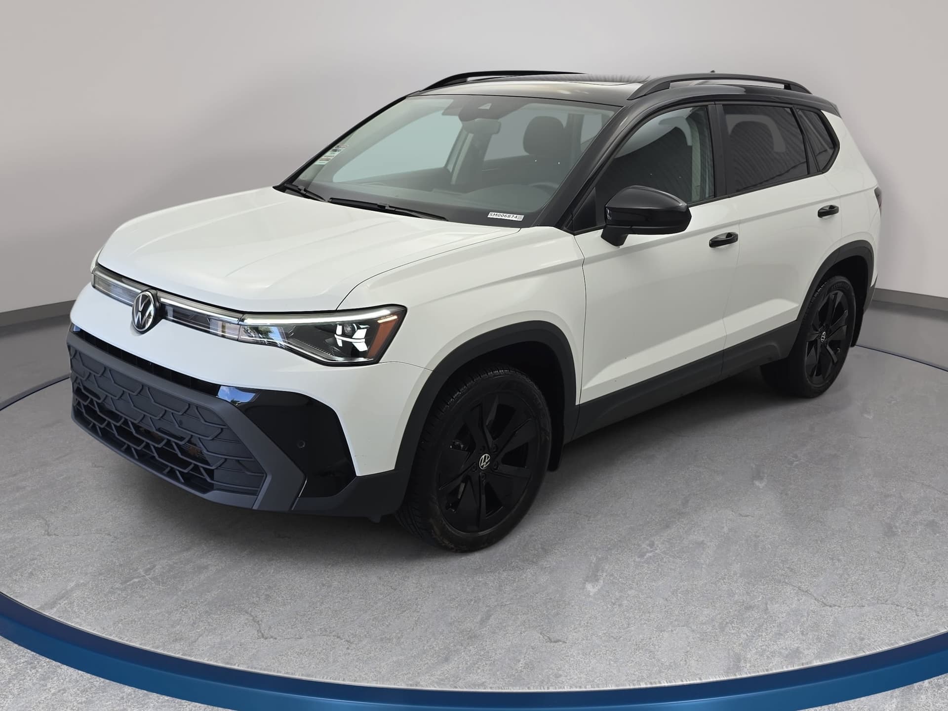 2025 Volkswagen Taos SE Black — photo 1 of 35