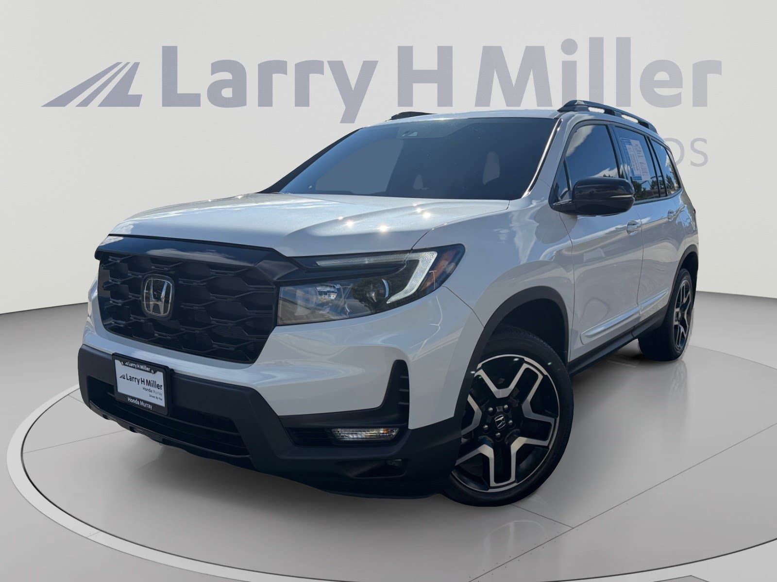 2023 Honda Passport Elite — photo 1 of 35