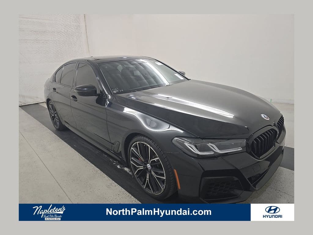 2023 BMW 5 Series M550i xDrive — photo 1 of 14