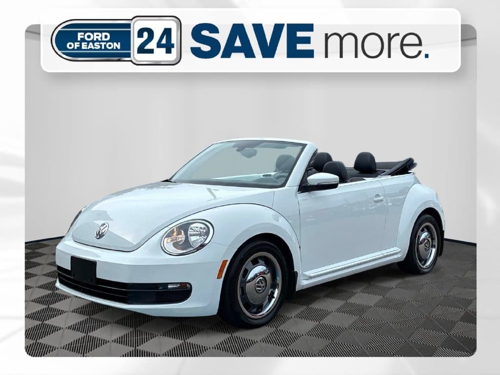 2016 Volkswagen Beetle Convertible 1.8T Denim — photo 1 of 42