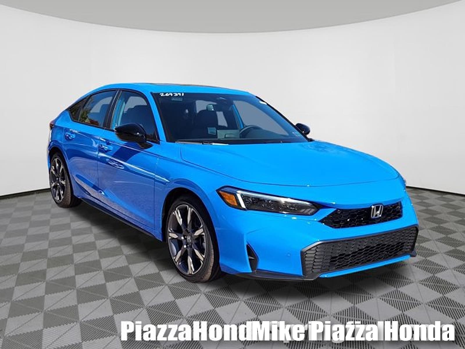 2026 Honda Civic Hatchback Hybrid Base — photo 1 of 14