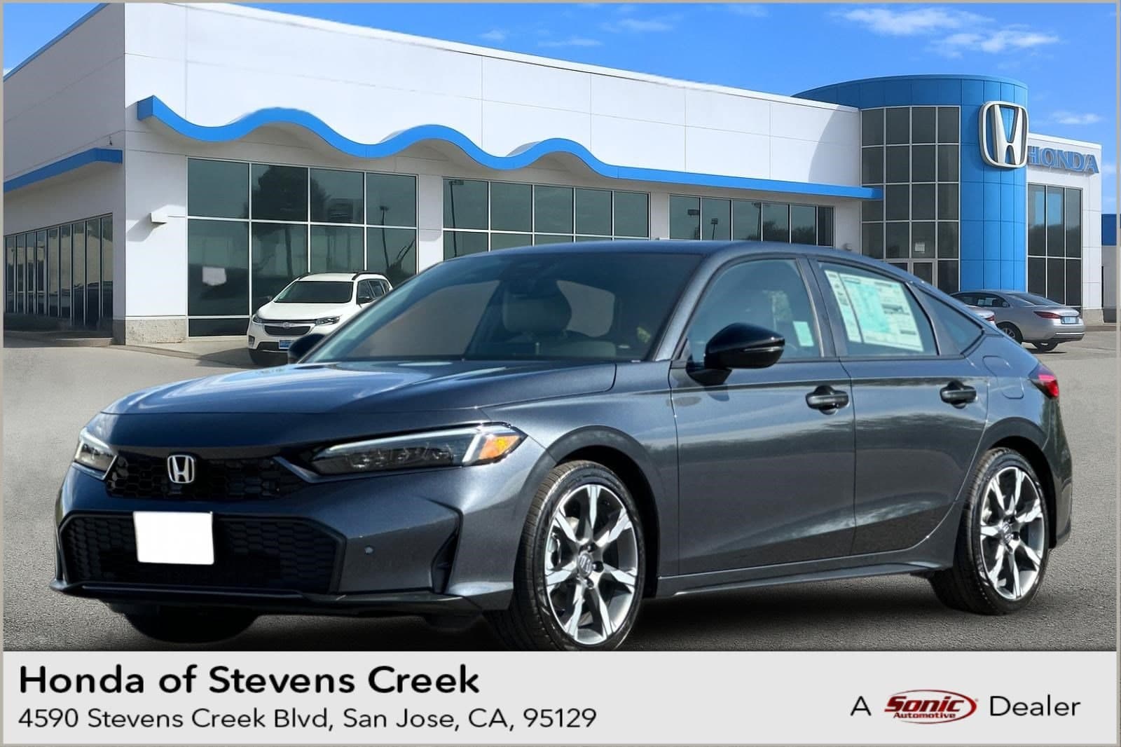 2026 Honda Civic Hatchback Hybrid Sport Touring — photo 1 of 31