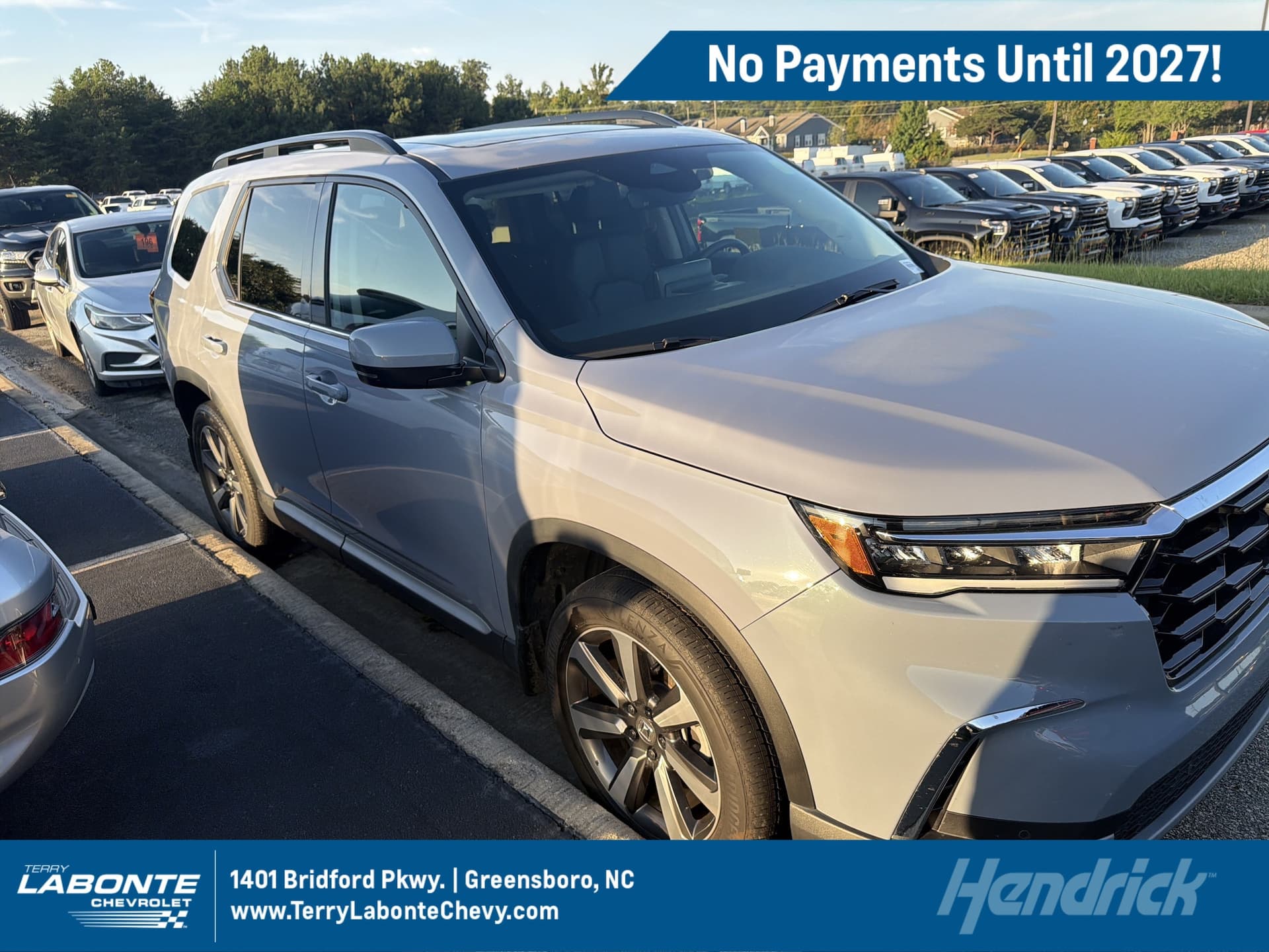 2025 Honda Pilot Touring — photo 1 of 12