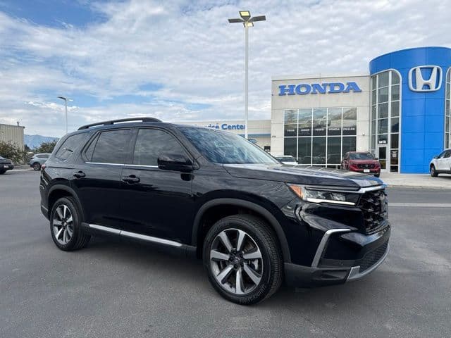 2024 Honda Pilot Touring — photo 1 of 31