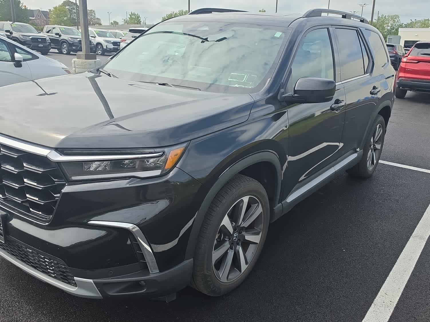 2024 Honda Pilot Touring — photo 1 of 18