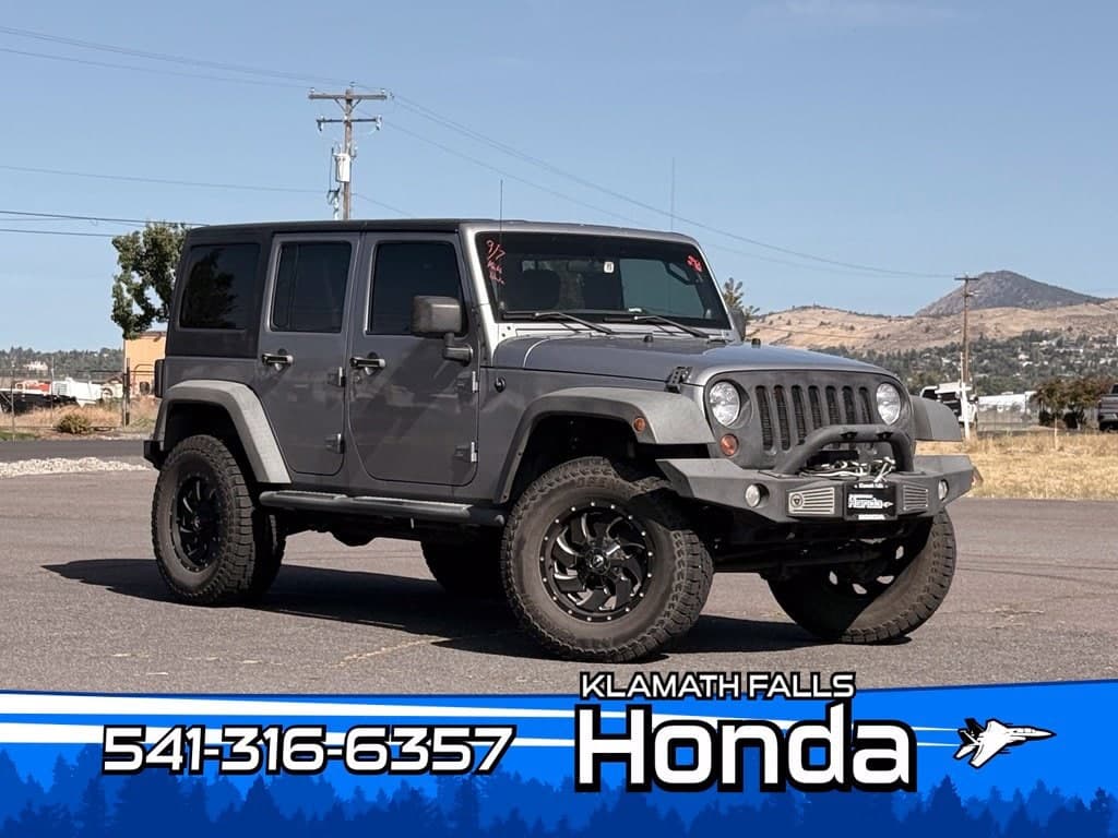 2013 Jeep Wrangler Unlimited Sport — photo 1 of 26