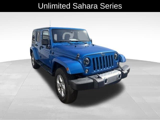 2015 Jeep Wrangler Sahara — photo 1 of 17