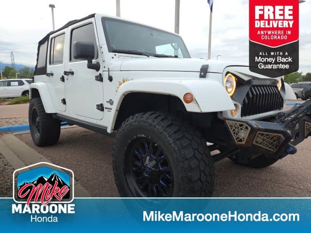 2014 Jeep Wrangler Unlimited Sport — photo 1 of 15