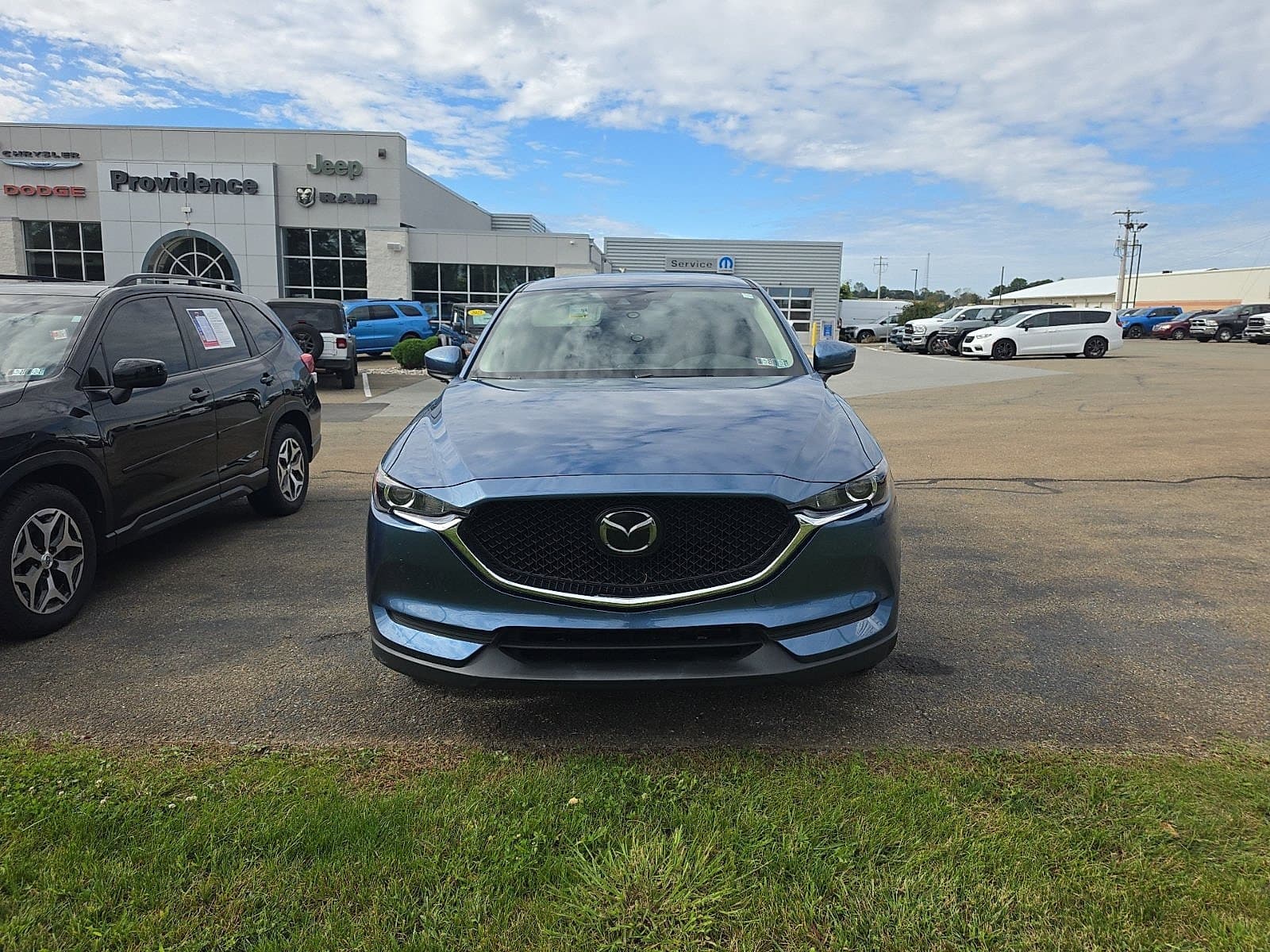 2021 Mazda CX-5 Sport — photo 1 of 10