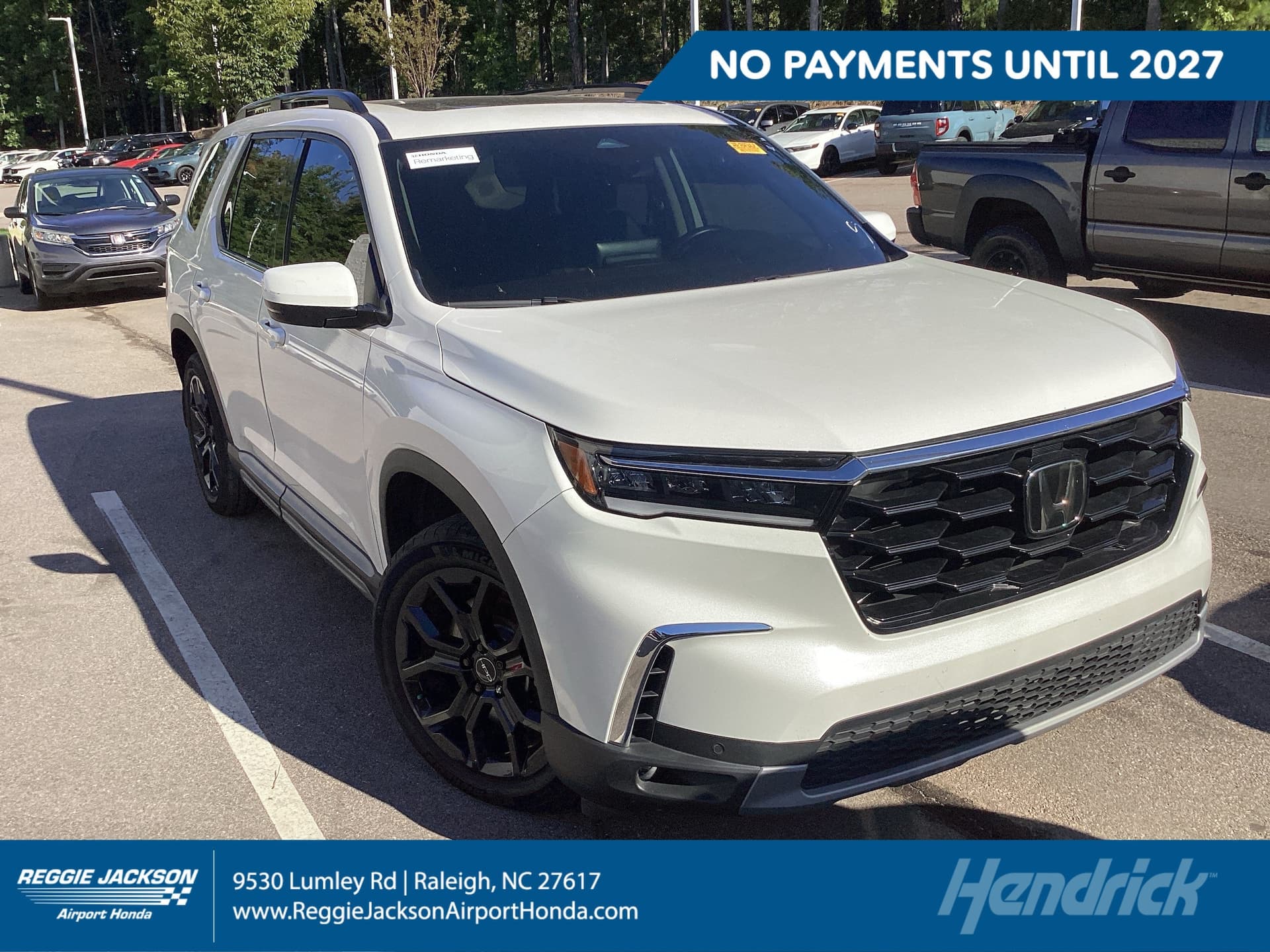2025 Honda Pilot Touring — photo 1 of 12
