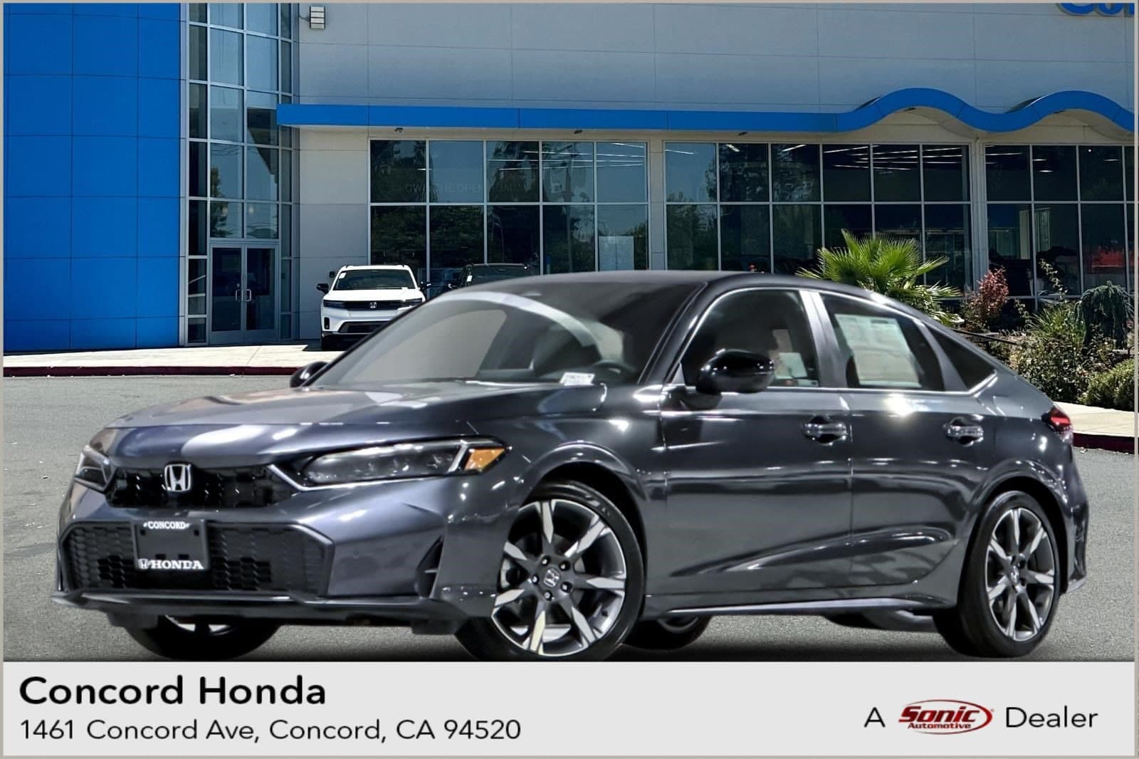 2026 Honda Civic Hatchback Hybrid Sport Touring — photo 1 of 33