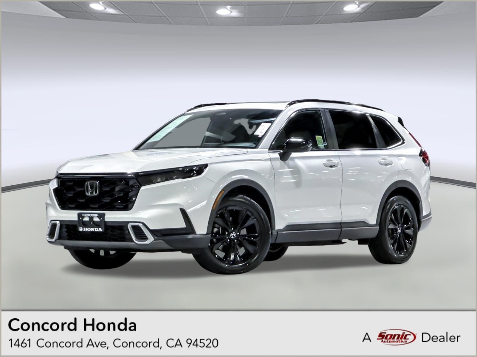 2023 Honda CR-V Hybrid Sport Touring — photo 1 of 36