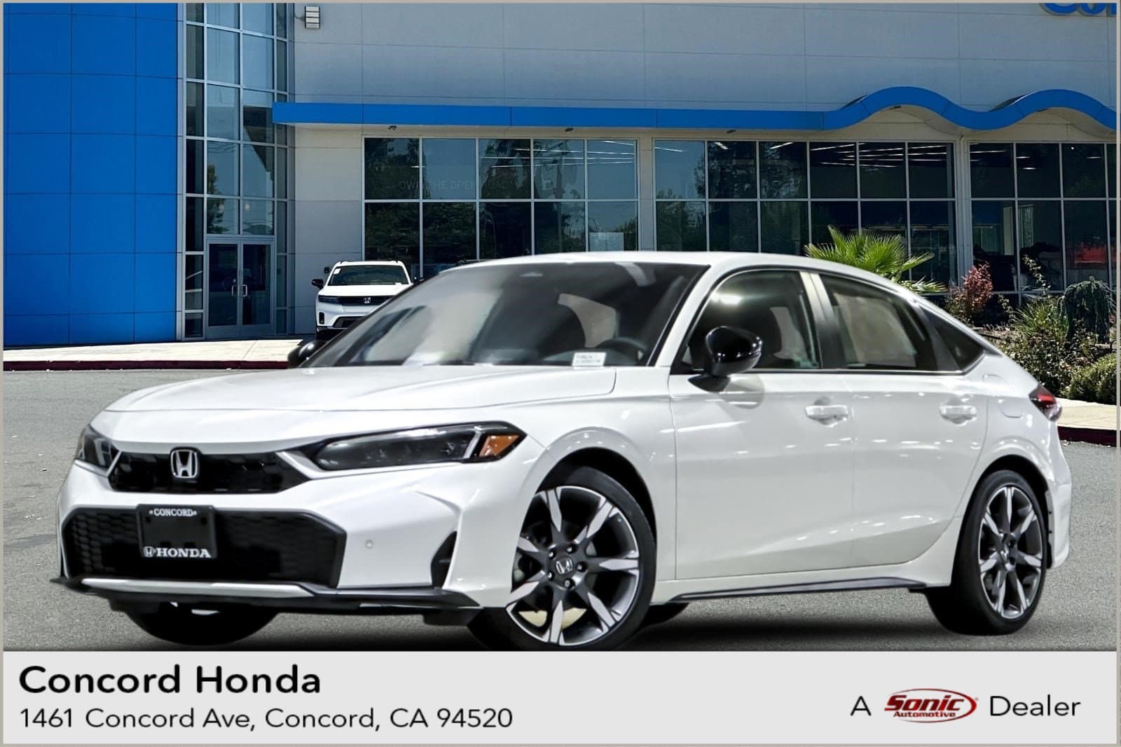 2026 Honda Civic Hatchback Hybrid Sport Touring — photo 1 of 32