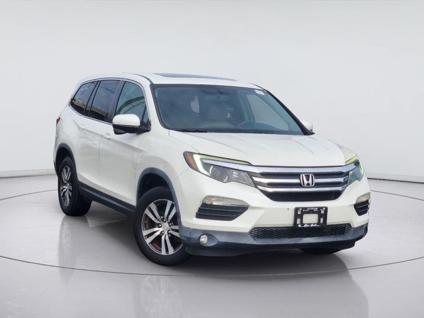 2017 Honda Pilot EX-L — photo 1 of 34