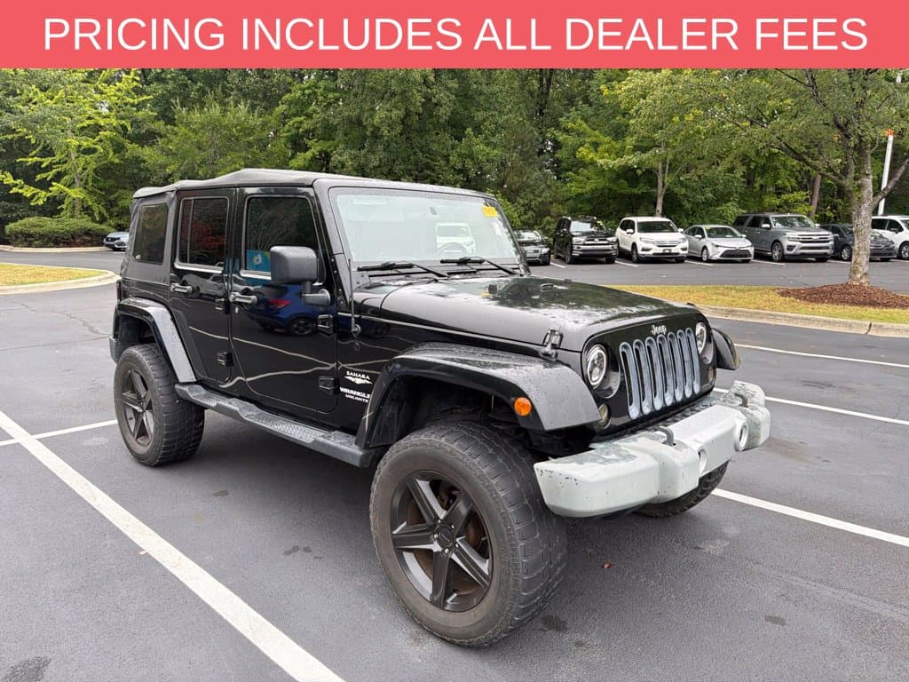 2010 Jeep Wrangler Unlimited Sahara — photo 1 of 14