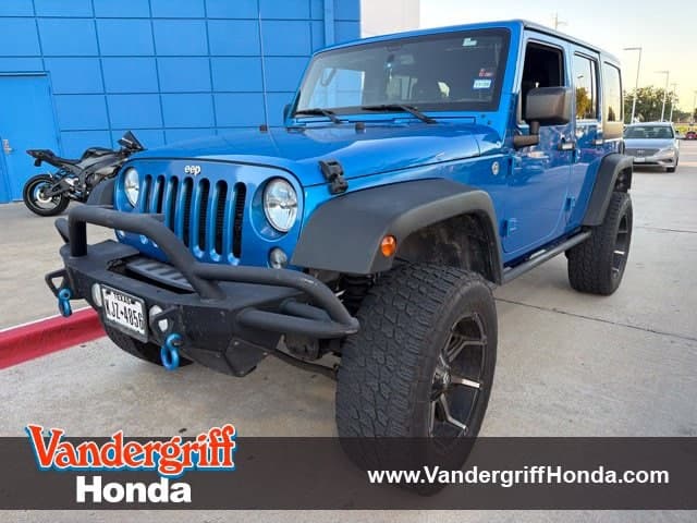 2015 Jeep Wrangler Sport — photo 1 of 16
