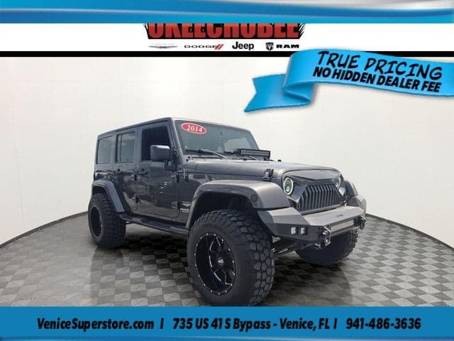 2014 Jeep Wrangler Unlimited Sahara — photo 1 of 38