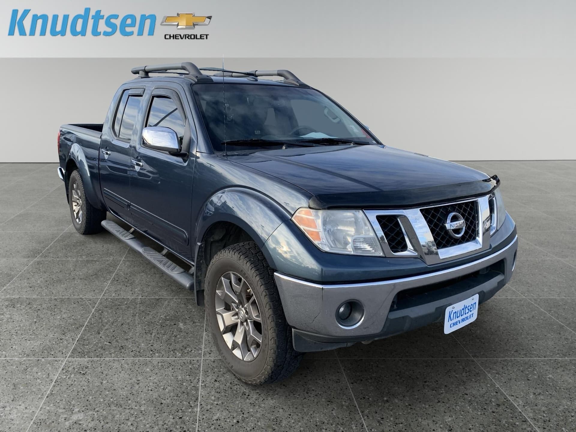 2014 Nissan Frontier SL — photo 1 of 10