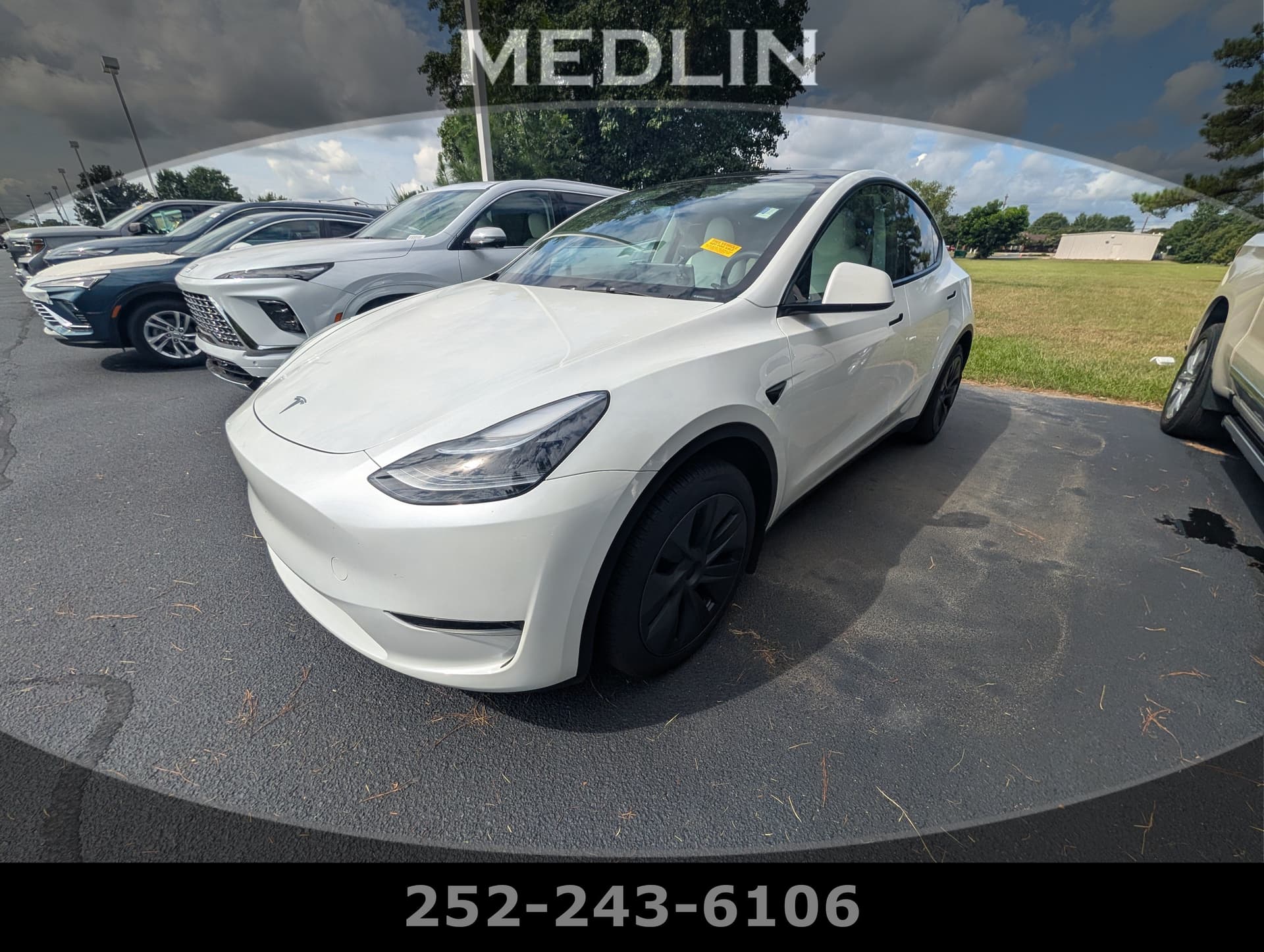 2025 Tesla Model Y Long Range — photo 1 of 31