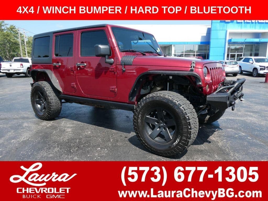2012 Jeep Wrangler Unlimited Sport — photo 1 of 30