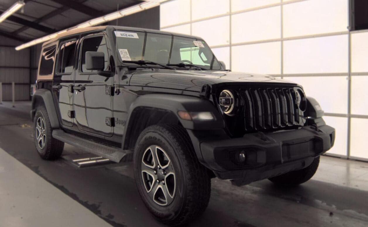 2020 Jeep Wrangler Unlimited Black and Tan — photo 1 of 5