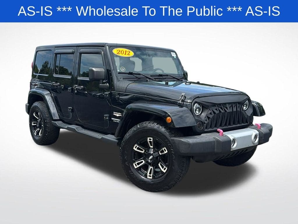 2012 Jeep Wrangler Unlimited Sahara — photo 1 of 14