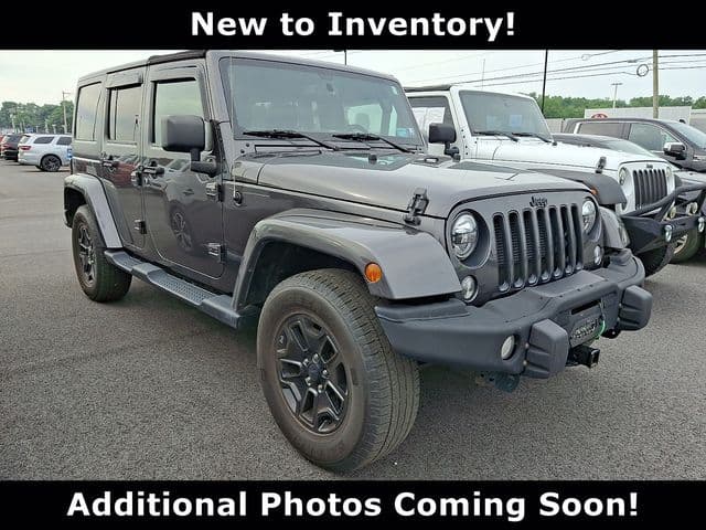2016 Jeep Wrangler JK Unlimited Sahara 4x4 — photo 1 of 10