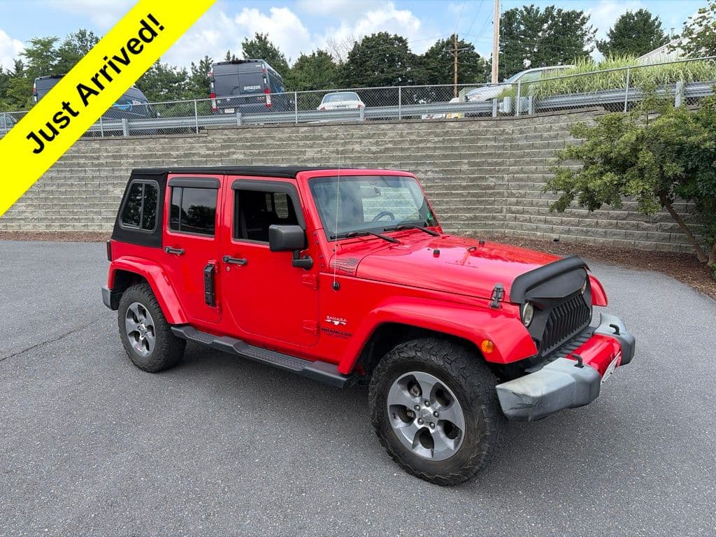 2016 Jeep Wrangler JK Unlimited Sahara 4x4 — photo 1 of 12