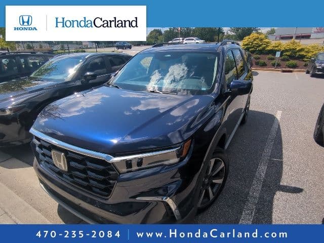 2025 Honda Pilot Touring — photo 1 of 11