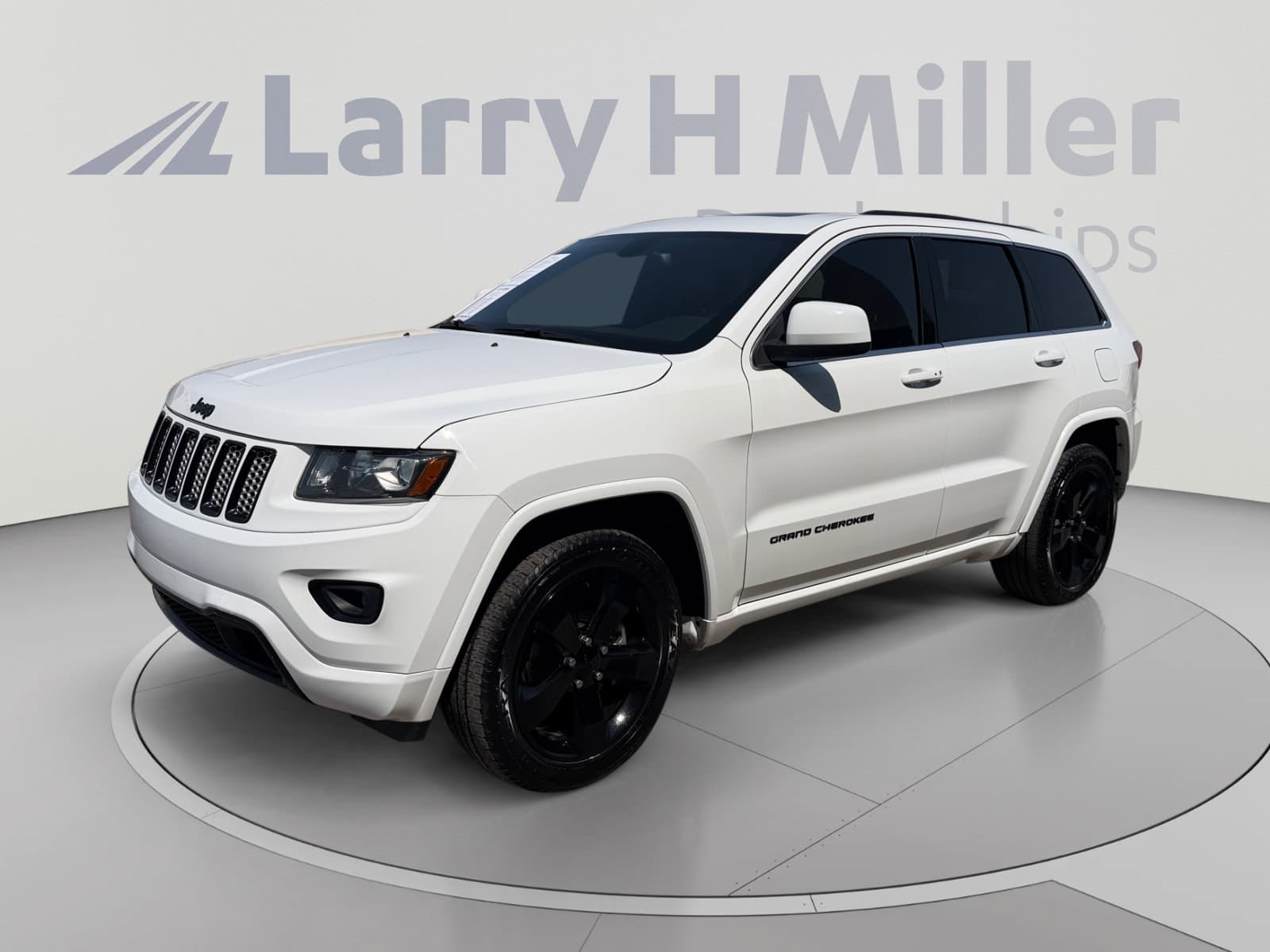 2015 Jeep Grand Cherokee Altitude — photo 1 of 36
