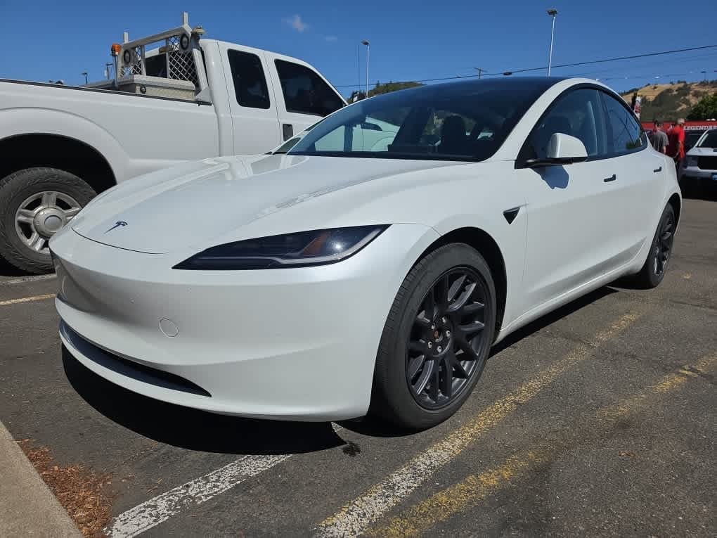 2025 Tesla Model 3 Long Range — photo 1 of 6