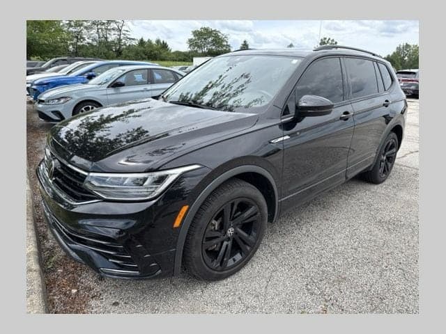 2023 Volkswagen Tiguan 2.0T SE R-Line Black w/ IQ Drive & Pano Moon — photo 1 of 13