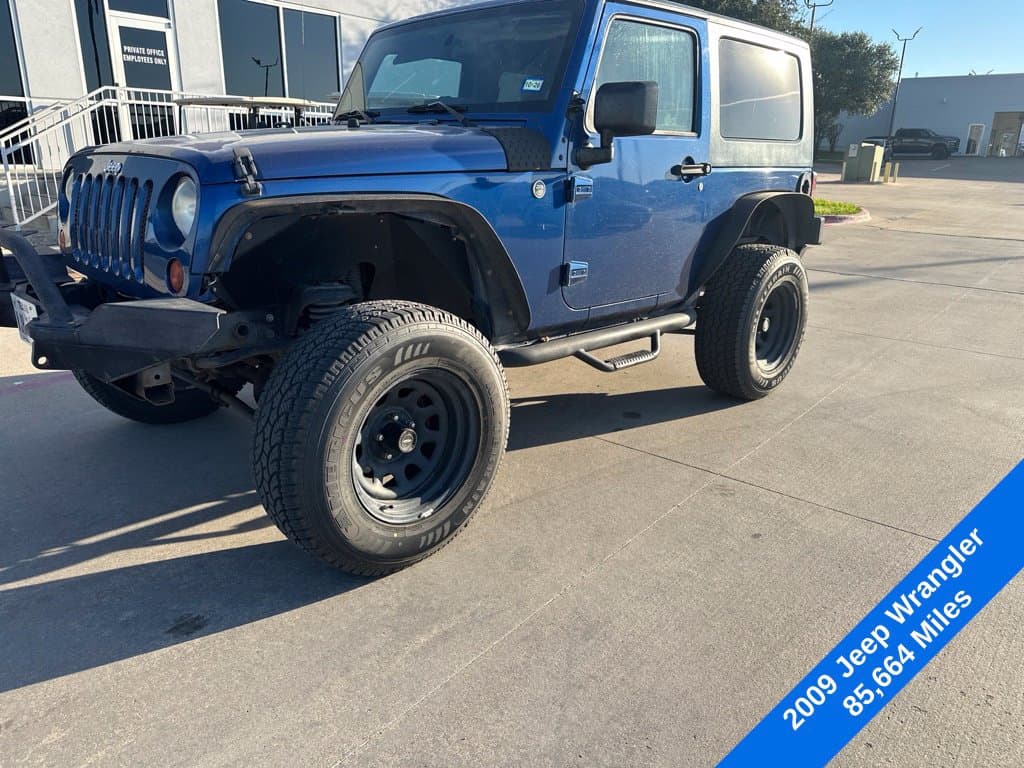 2009 Jeep Wrangler X — photo 1 of 17